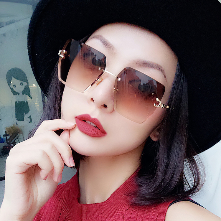 2021 Fashion Trimmed Rimless Sunglasses...