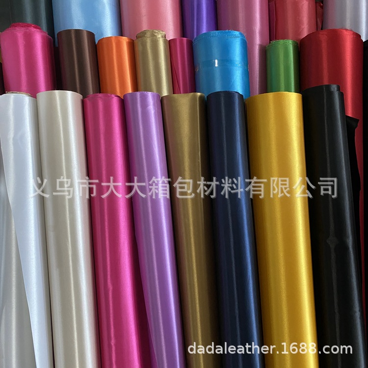 Yiwu Dada Factory Direct sales of lustrous leather single-color butyl foam five-beauty satin bottom foam bag fabric detail image 2