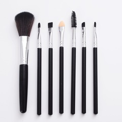 7-piece makeup brush set in PVC bag including eyeshadow brush, loose powder brush, blush brush, spiral eyelash brush, sponge brush, and eye brush