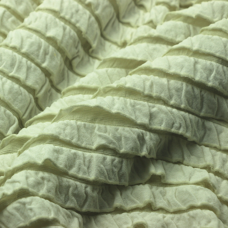 牛百叶窗布针织纬编全涤水熔丝色织染色提花牛百叶布女装裙子面料