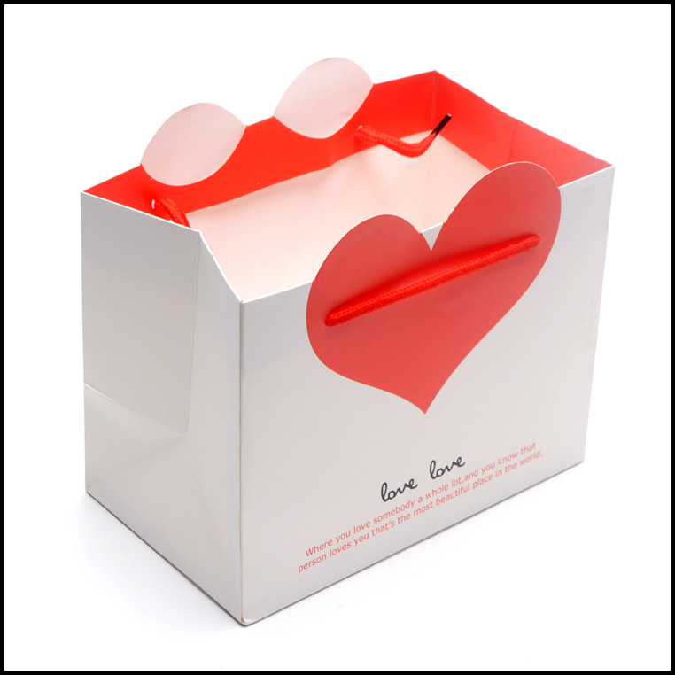 白色红心纸袋 手提袋 服装袋 包装袋通用礼品纸袋 广告袋纸袋