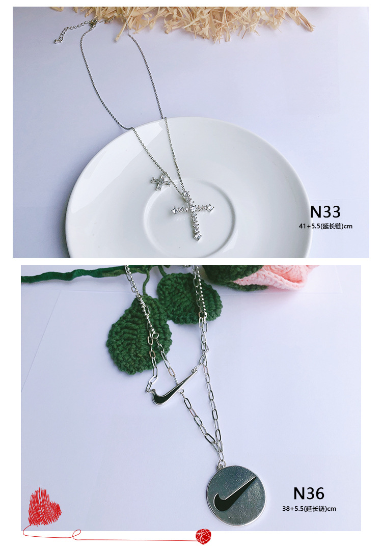 时尚酷女冷淡风INS欧美笑脸十字架钩子ins风潮人个性多层秋冬毛衣详情图2