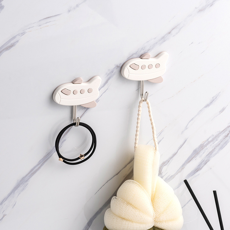 Tienda de departamentos al por mayor ropa creativa gancho de plástico nórdico simple gancho pegajoso fuerte detrás de la puerta cocina 972 gancho pegajoso