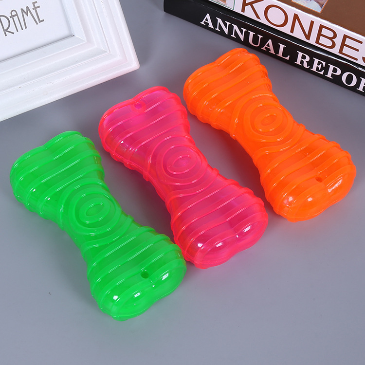 Suministros para mascotas perro juguete transparente TPR molar diente limpieza sonido hueso juguete ventas directas de la fábrica en stock al por mayor