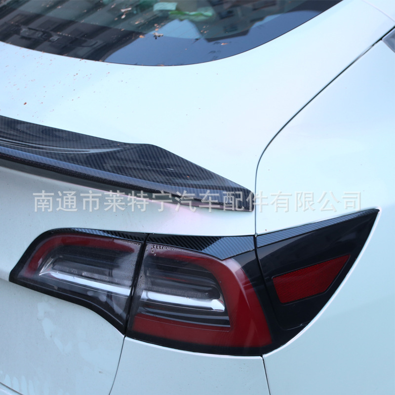 Aplicable a Tesla model3 Acero inoxidable trasero luz trasera ceja pegatinas decorativas accesorios de modificación