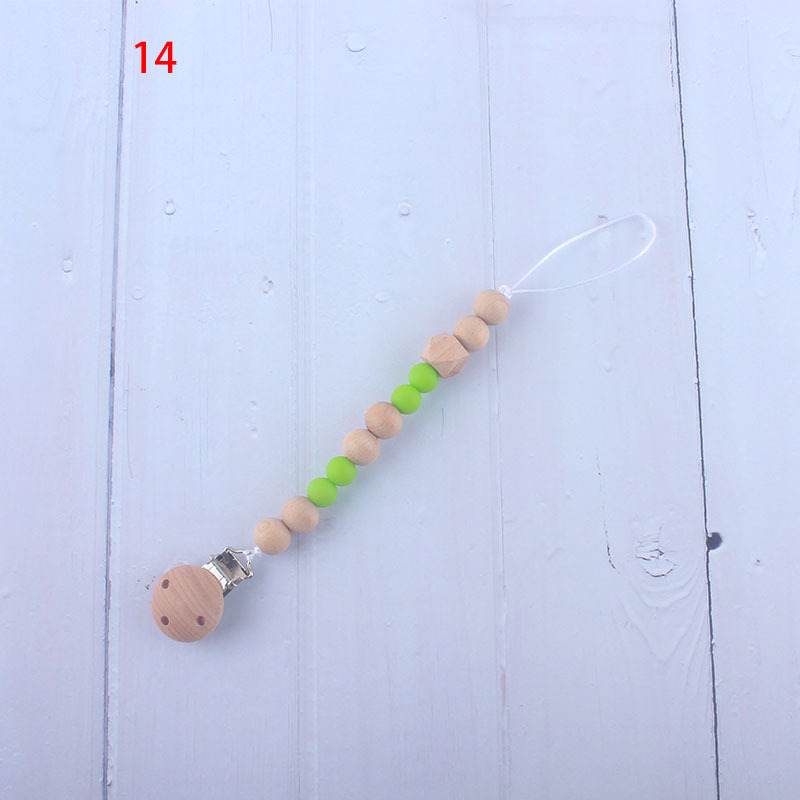 Nueva fábrica directa bebé Beech juguete mordedor bebé chupete de silicona pezón anti-gota cadena materna y infantil suministros