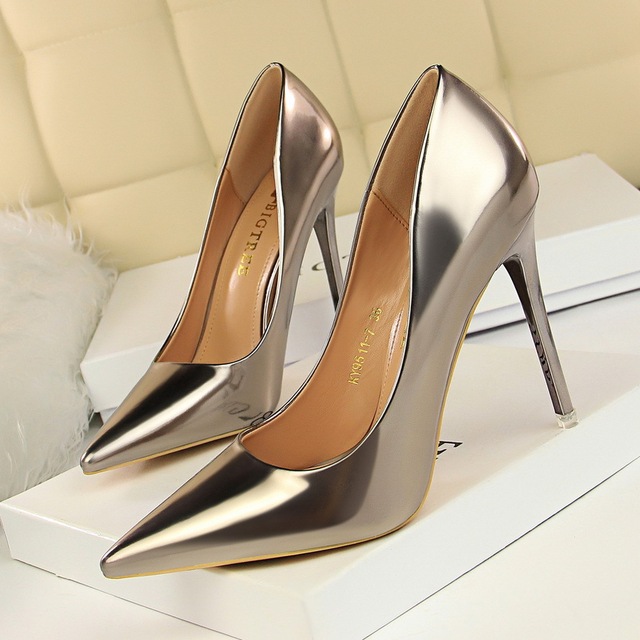 9511-a7 European and American fashion sexy metal heel high heel shallow mouth pointed nightclub show thin high heel shoe