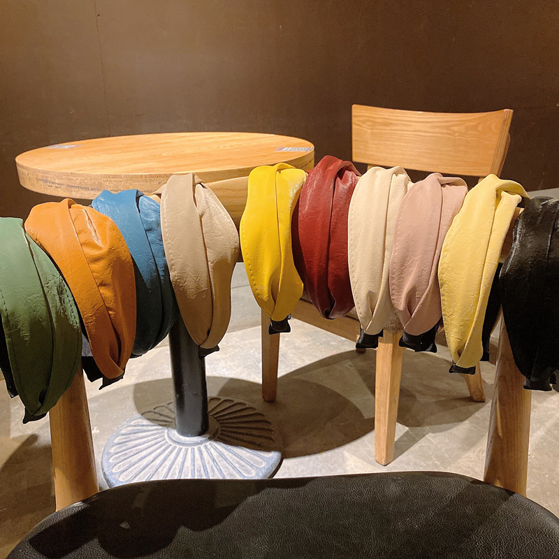 140g Weight Headwear Classification Festival Occasion Pu Leather Material Geometric Pattern Women'S Gender Khaki, Beige, Pink, Green, Blue, Wine Red, Yellow, Black Color Simple Style Wide-brimmed Cross Solid Color Leather Headband Wholesale 4