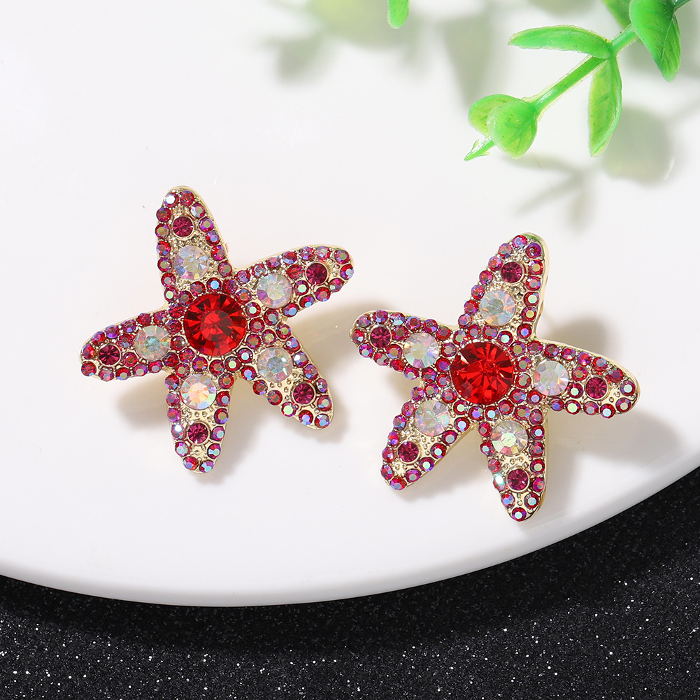 Pendientes Salvajes De Diamantes De Color De Estrella De Mar Personalizados De Moda Súper Flash De Cinco Puntas En Forma De Estrella Lindos Pendientes De Temperamento Japonés Y Coreano Al Por Mayor display picture 11