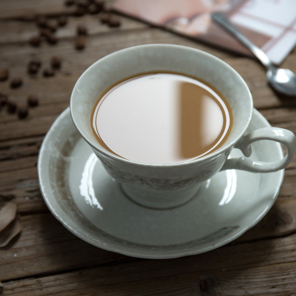 Taza de café de cerámica de estilo europeo y platillo traje hogar Luz lujo té de la tarde taza de café al por mayor pareja regalo taza de café y platillo