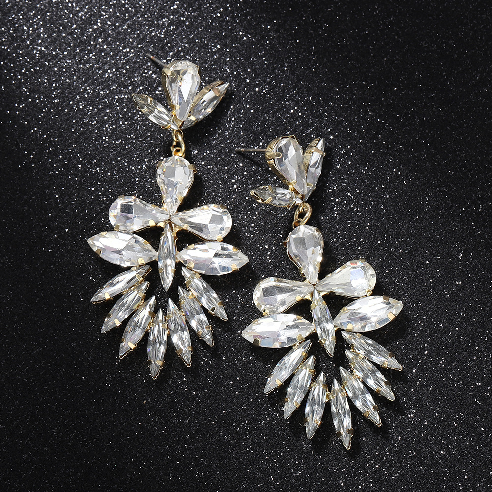 Fashion Leaf Colored Diamond Exaggerated Luxury Trendy Temperament Star Wild Hand-clamped Diamond Full Diamond Earrings Wholesale Nihaojewelry display picture 4