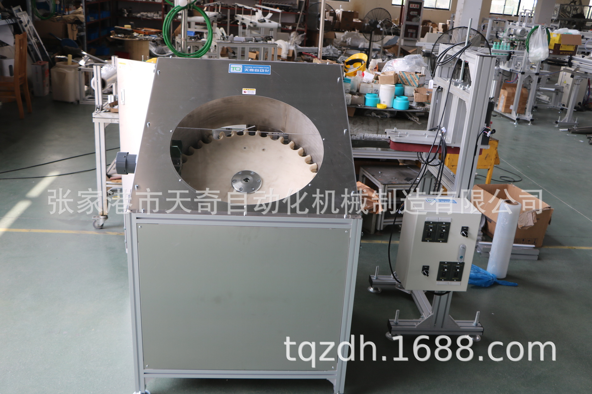 天奇公司专业生产塑料圆瓶自动理瓶机