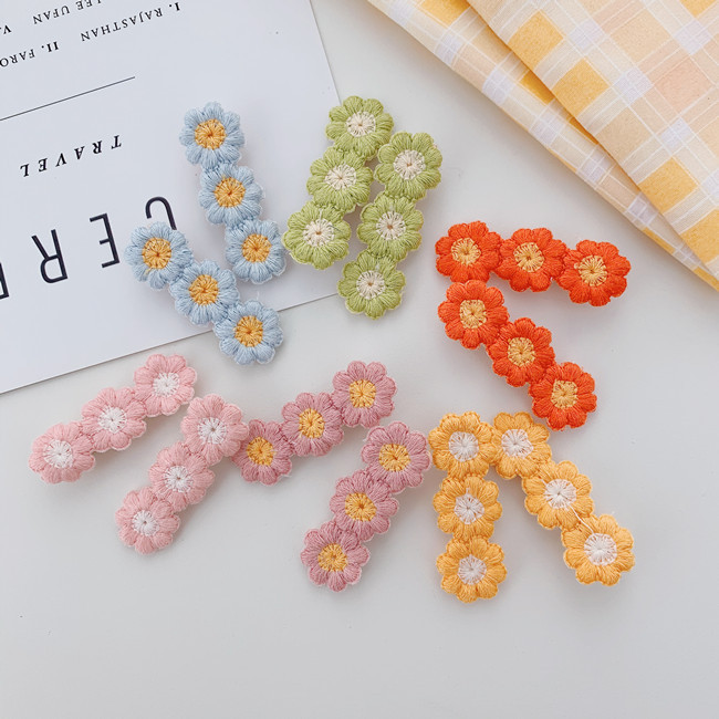 Korean Small Daisy Flower Wool Edge Clip Candy Color Bangs Hairpin Wholesale display picture 2