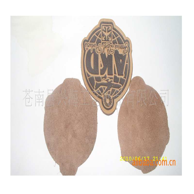 专业供应pu变色热压皮革商标  服装辅料商标箱包标批发 设计d制