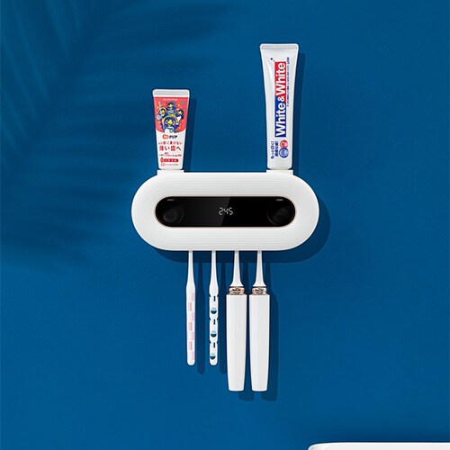 Smart toothbrush sterilizer Household ultraviolet UV sterilization toothbrush holder wall-mounted punch-free disinfection box manufacturer