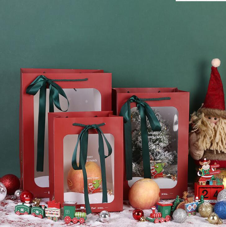 En stock Bolsa de regalo de Navidad bolso de la ventana Nochebuena Apple embalaje caja de cartón regalo de mano caja de dulces bolsa de regalo