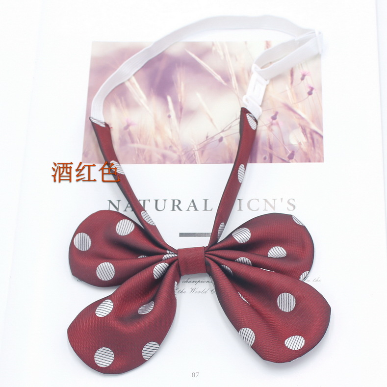 Pluma curvada raíz conejo oreja collar flor pajarita femenina estilo coreano lunares lindo arco JK uniforme pajarita fabricante en stock