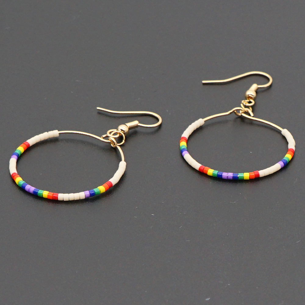 Fashion Exaggerated Rice Bead Woven Large Hoop Earrings display picture 3