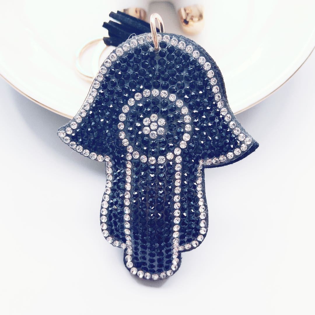 Venta caliente transfronteriza de Palma llavero coreano terciopelo rhinestone gato ojo llavero bolsa colgante accesorios en stock