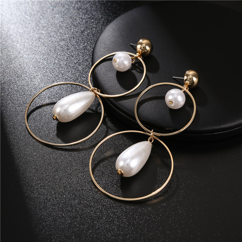 Korean New Fashion Wild Pearl Hollow Circle Geometric Long Earrings Wholesale display picture 3