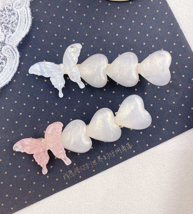 South Korea Butterfly Pearl Rhinestone Side Clip Simple Fashion Love Cute Hairpin Wholesale Nihaojewelry display picture 4