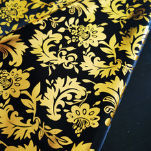 厂家销售涤纶弹力烫金布工艺包边布 金色凤尾花装饰针织面料批发