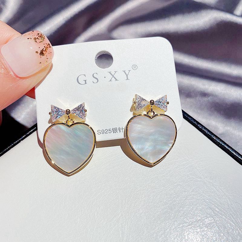 New Korean S925 Silver Needle Natural Shell Heart-shaped Zircon Bow Earrings For Women display picture 1