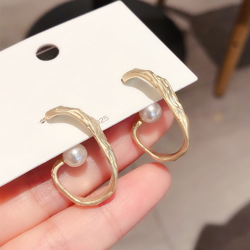 Asymmetrical matte golden earrings handmade pearl