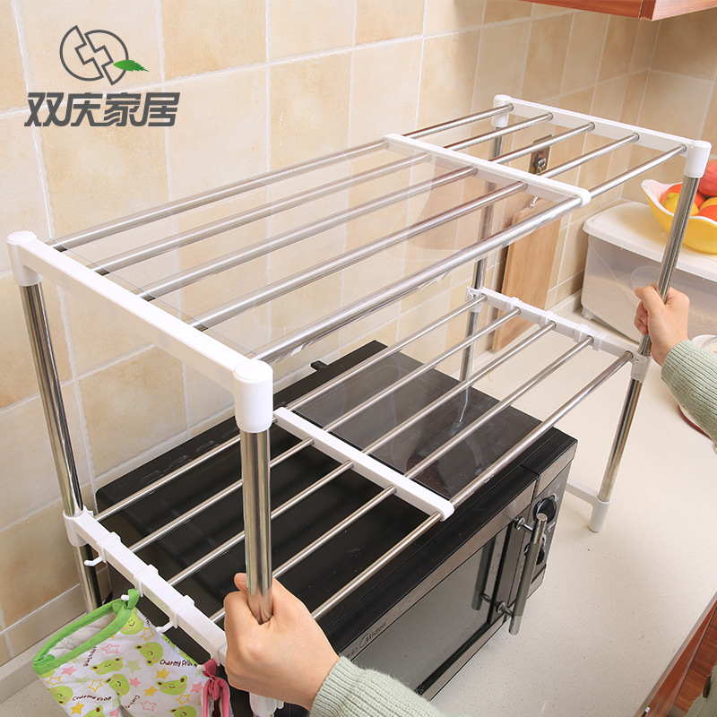 Estante de cocina personalizado Estante de almacenamiento de horno de microondas telescópico de acero inoxidable Estante de horno creativo de piso Gabinete