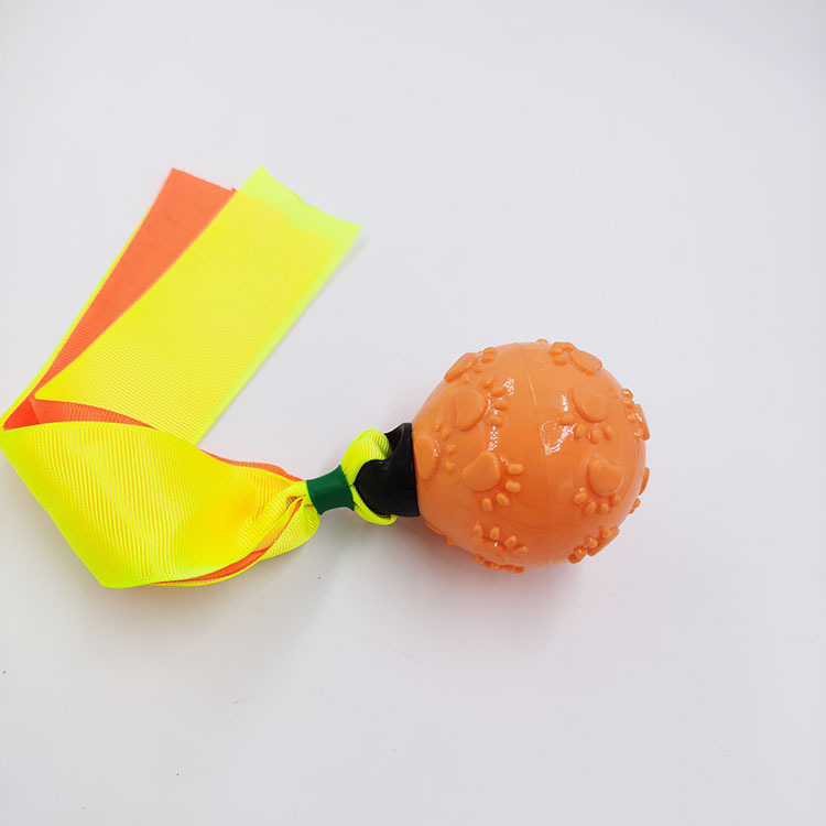 Nuevo suministro directo de fábrica Amazon mascota perro sonido juguete interactivo mordedura-resistente TPR cinta Bola de juguete al por mayor