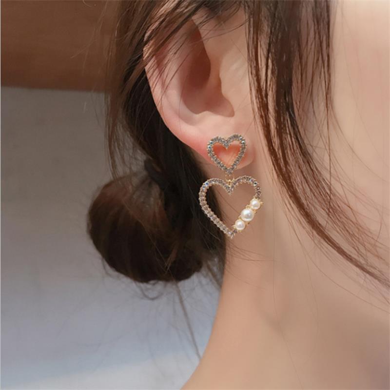 925 Silver Needle Fashion Korean Full Diamond Double Love Hollow Peach Heart Pearl New Trendy Earrings display picture 3