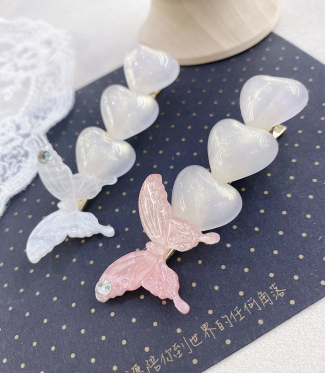 South Korea Butterfly Pearl Rhinestone Side Clip Simple Fashion Love Cute Hairpin Wholesale Nihaojewelry display picture 9