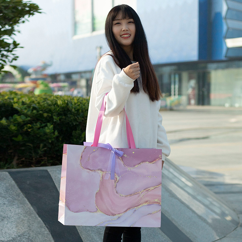 Colorido patrón de piedra cinta bolsa de regalo de mano ins estilo bolsa de regalo bolsa de ropa Rosa niña corazón bolsa de regalo de cumpleaños