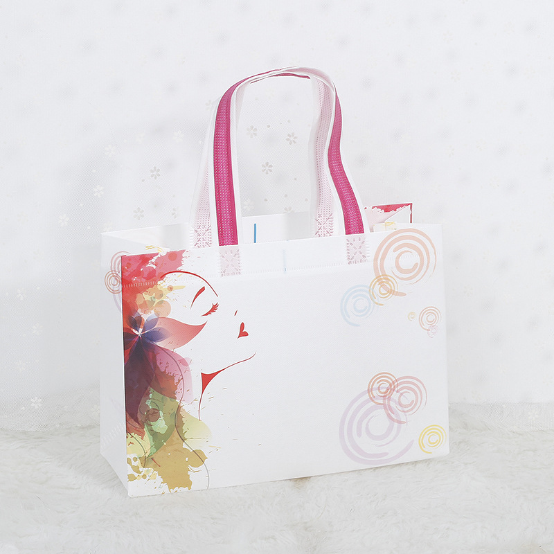 En stock bolsa de tienda de ropa logotipo personalizado bolsa de protección ambiental personalizada bolsa de embalaje de cuatro piezas bolso no tejido recubierto