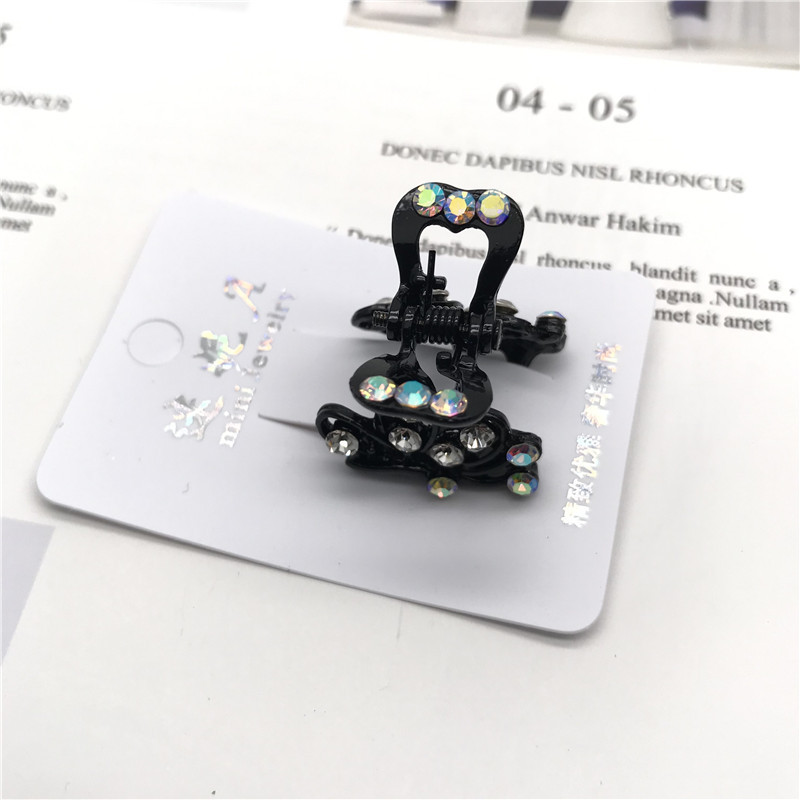 Venta caliente negro diamante incrustado pequeño clip superior clip lateral un yuan una pieza dos yuanes tienda accesorios para el cabello cabeza accesorios puesto de suministro