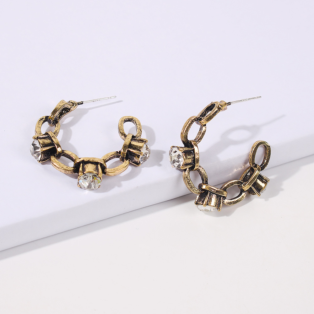 Baroque Retro C-shaped Fashion Diamond Earrings display picture 8