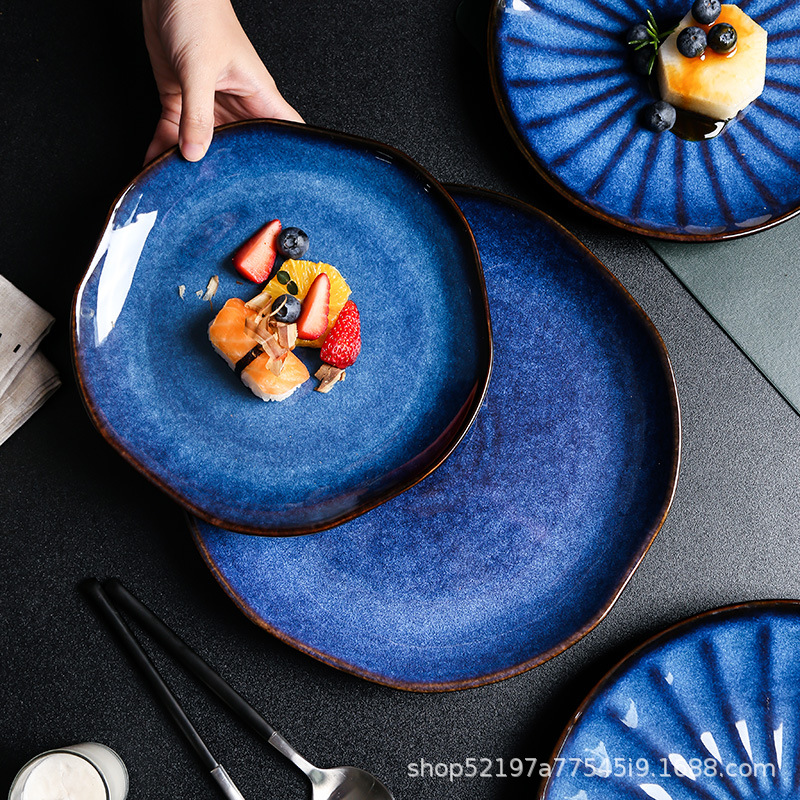 El horno de estilo japonés se convierte en cerámica creativa, plato occidental, plato de carne, plato de verduras, plato de forma especial, fabricante de vajilla para el hogar del hotel al por mayor