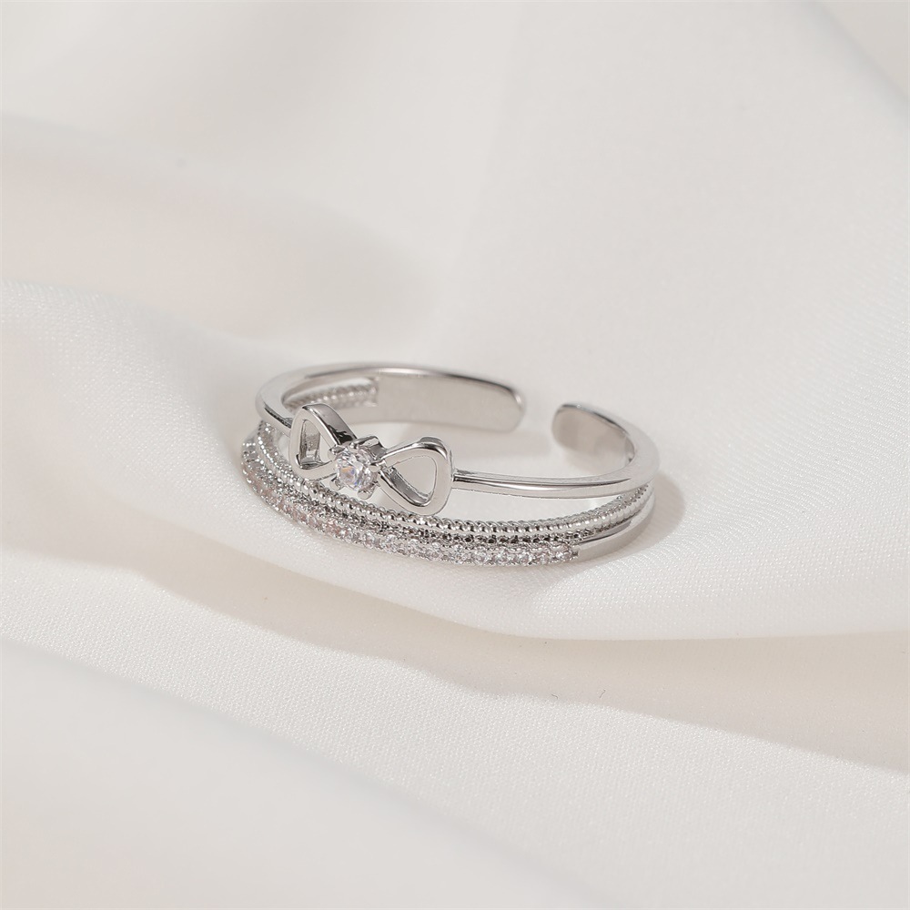 Simple   Personality Open Index Finger Ring  Fashion Micro-inlaid Zircon Double Bow Ring display picture 8