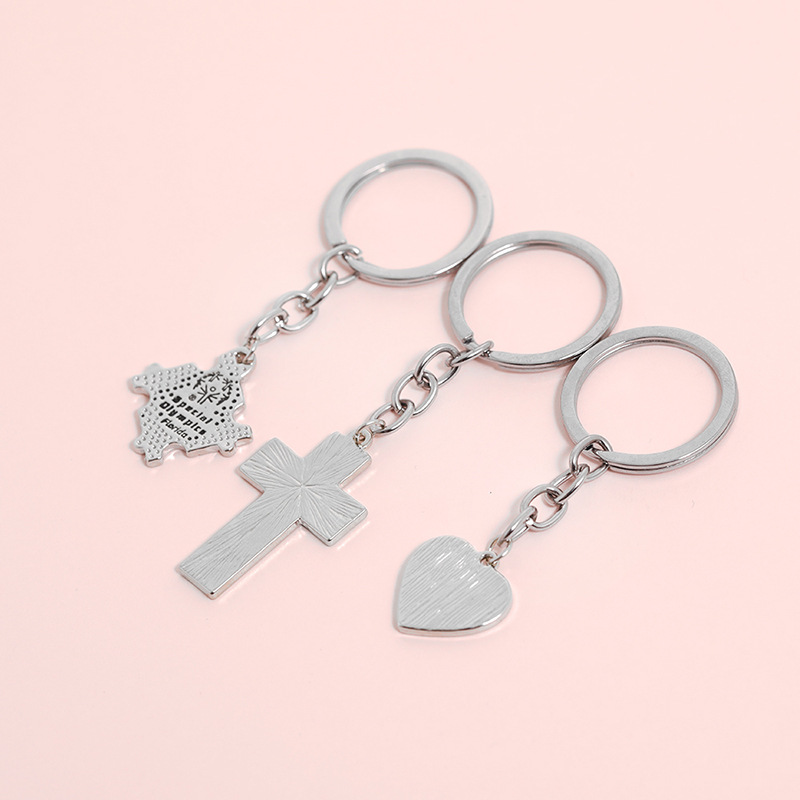 Creative Children's Four-color Puzzle Splicing Color Heart-shaped Cross Keychain Pendant display picture 8