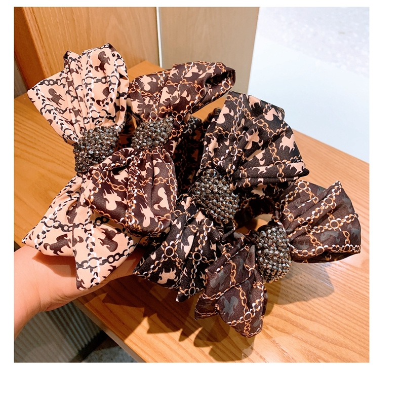 Korean Retro Silk Printing Wild Bow Full Diamond Wide-brimmed Hairpin Wholesale Nihaojewelry display picture 16