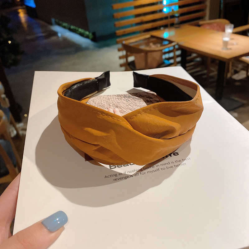 140g Weight Headwear Classification Festival Occasion Pu Leather Material Geometric Pattern Women'S Gender Khaki, Beige, Pink, Green, Blue, Wine Red, Yellow, Black Color Simple Style Wide-brimmed Cross Solid Color Leather Headband Wholesale 14