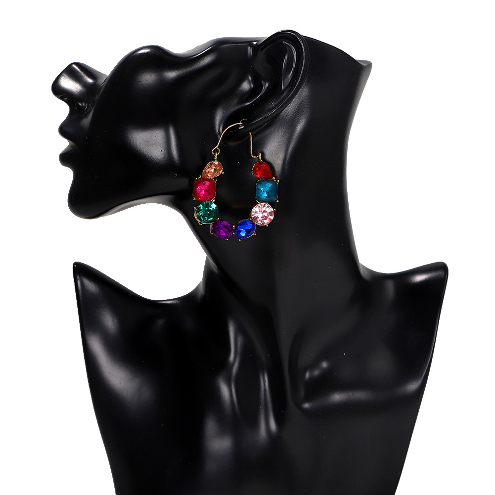 Colored Diamond Inlaid U-shaped Hollow Alloy Exaggerated Earrings Wholesale display picture 3