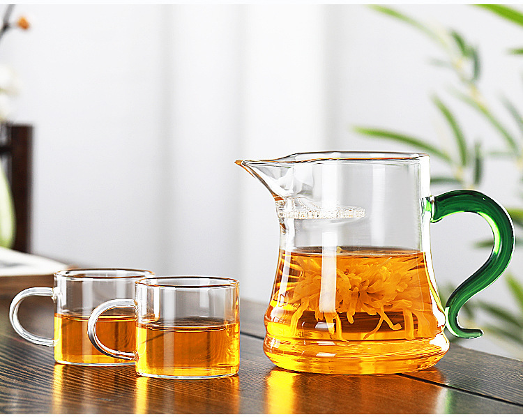 Fábrica al por mayor de vidrio grueso resistente al calor taza de feria águila boca filtro Kung Fu dispensador de Té Verde taza de la Media Luna justo