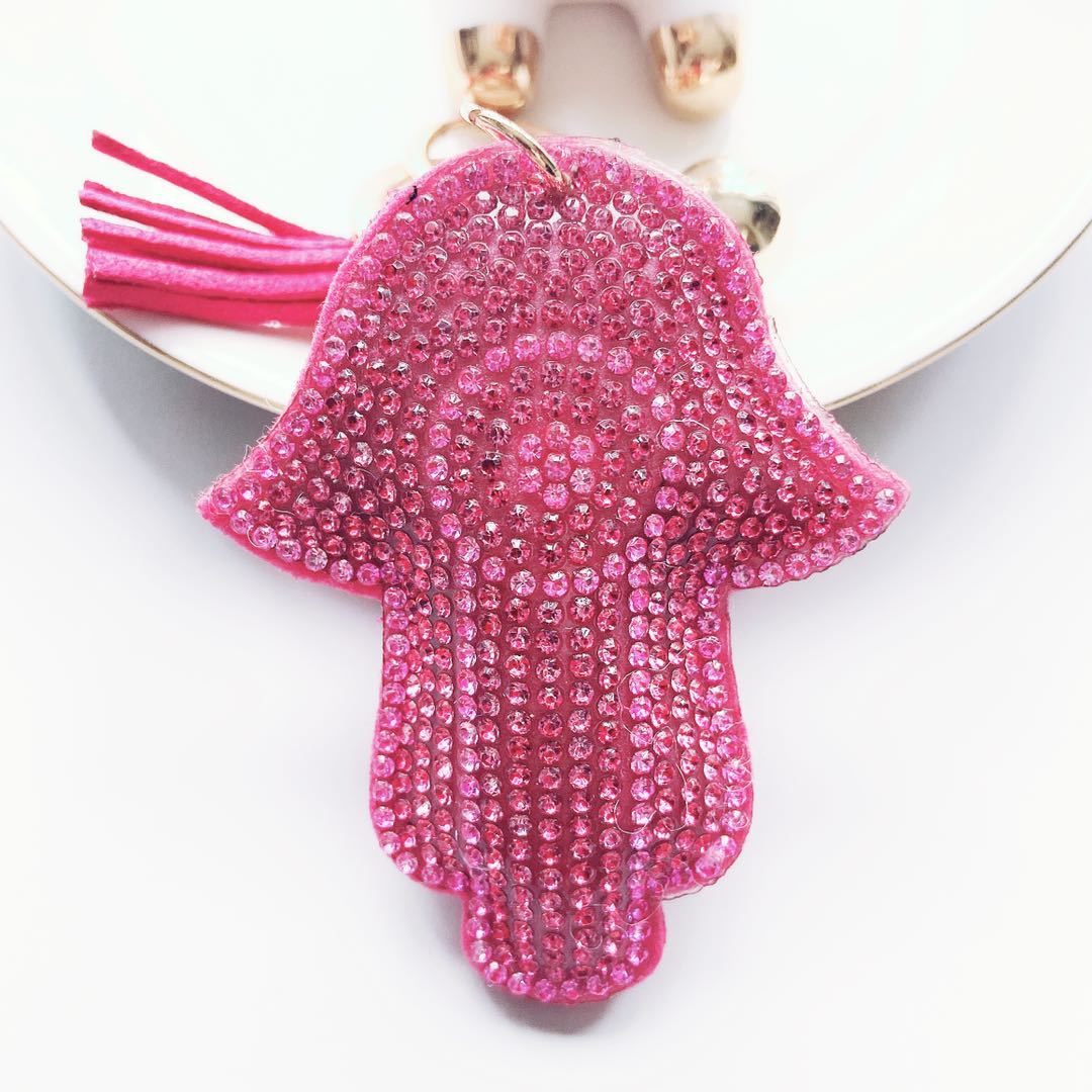 Venta caliente transfronteriza de Palma llavero coreano terciopelo rhinestone gato ojo llavero bolsa colgante accesorios en stock