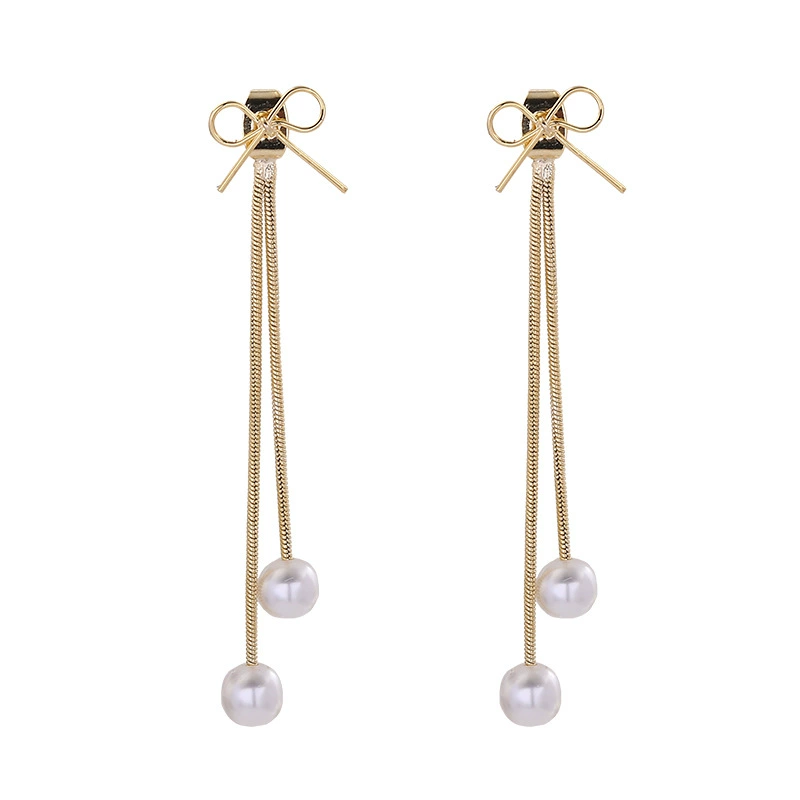 Universal earrings with bow from pearl, silver 925 sample