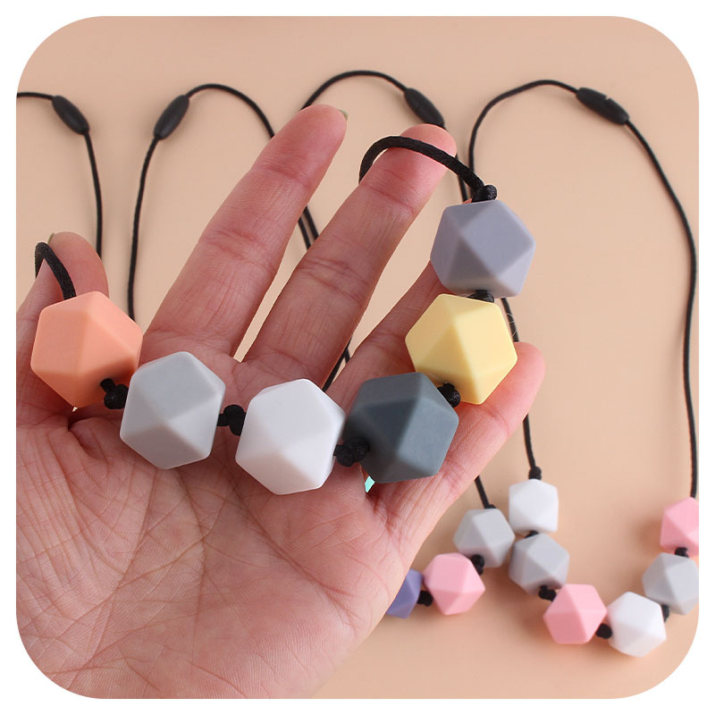 Comercio exterior Amazon collar nuevo bebé molar silicona octogonal mordedor collar masticable colgante mordedor palo