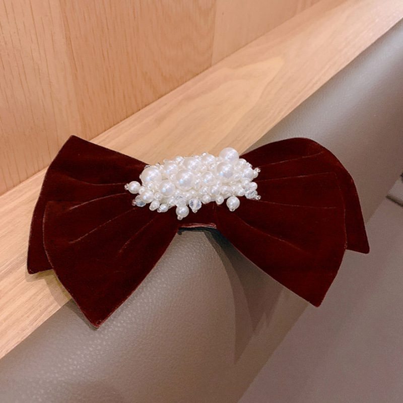 Korean Pearl Bow Diamond Hairpin Niche Cute Side Clip Top Clip Back Head Clip display picture 2
