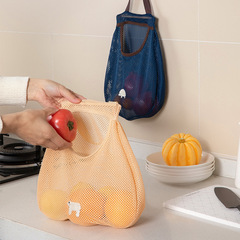 Kitchen multi-functional wall-mounted fruit and vegetable storage bag, portable ginger, garlic, onion, hollow mesh bag, breathable storage bag