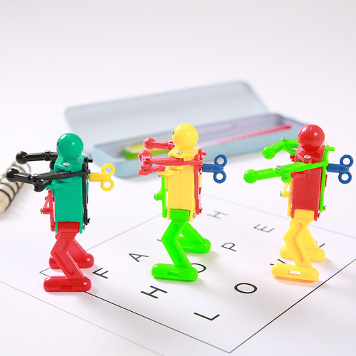Dancing robot puzzle nostalgic clockwork swing robot toy student wind-up gift wholesale