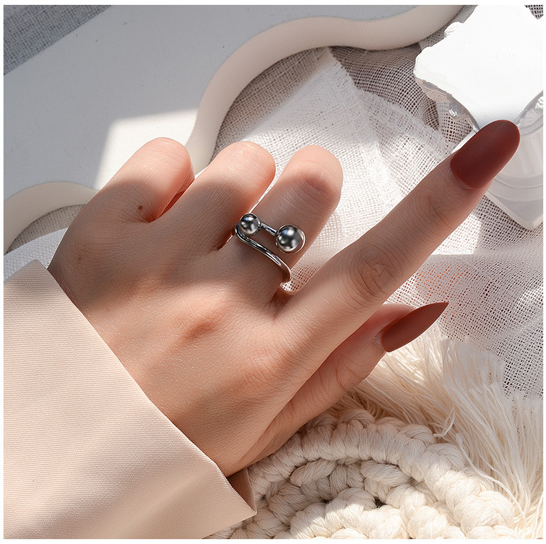 Creative Line Art Double Ball Ring Titanium Steel Plated Rings Wholesale display picture 9